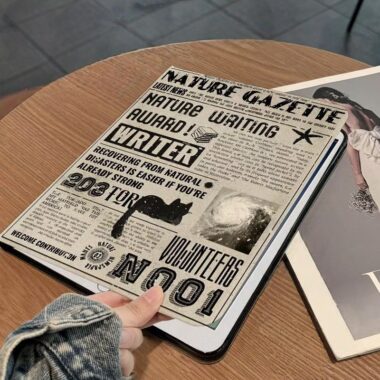 Black cat English newspaper shockproof full cover iPad case