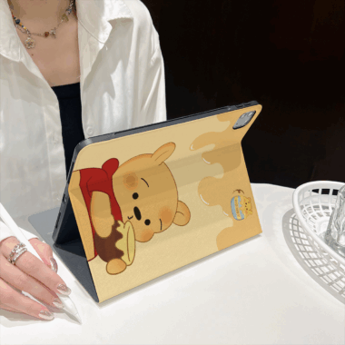 Cartoon Winnie the Pooh book-style soft iPad case with stand